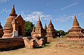 The cluster of red brick temples, named Khay-min-gha on the map on the North plain of Bagan. Myanmar. 